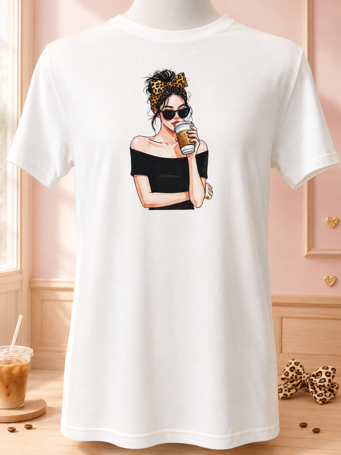 Short-sleeve shirt featuring a design of a girl with crossed arms drinking coffee.