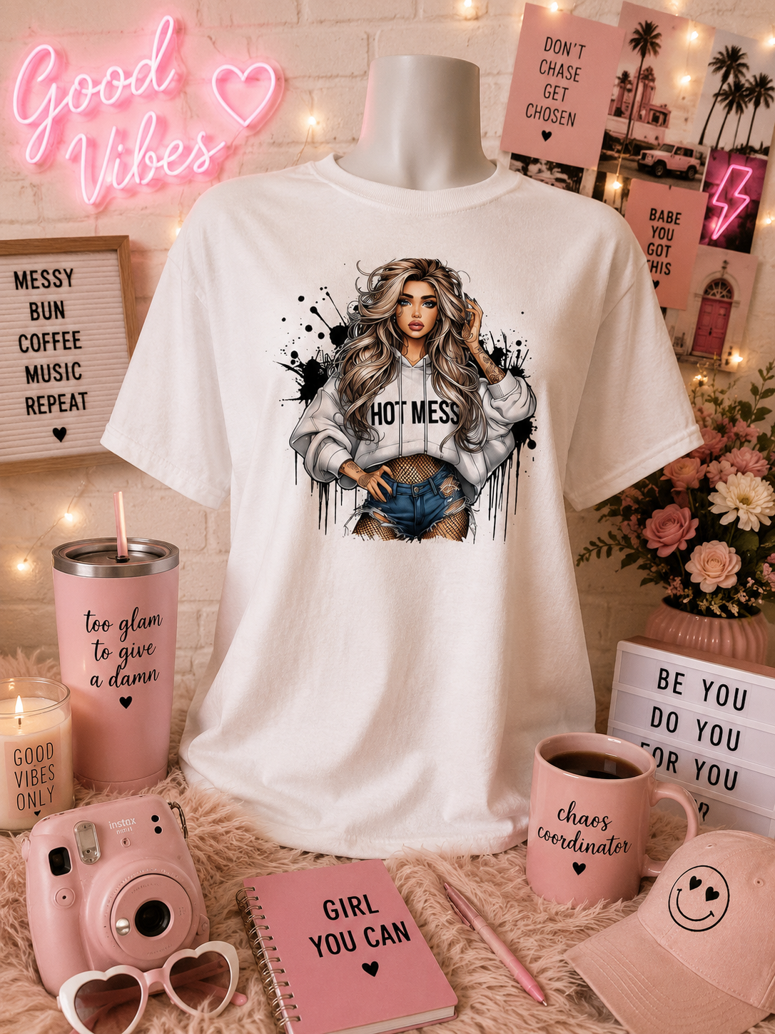 "Hot Mess" short-sleeve shirt for girls, worn with a sweater, with a hand resting on the head.