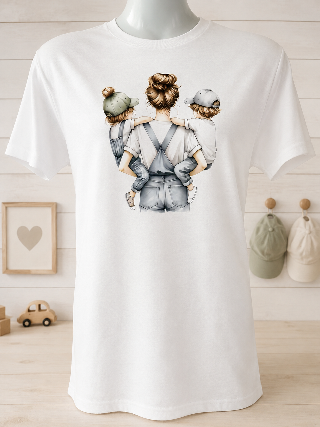 Short-sleeve T-shirt featuring a design of a mother carrying two children.