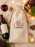 Beautiful canvas wine bottle bag ("But First Wine") with red and black lettering and a red wine glass—perfect for gifting. Size: 5.9" x 13.7".