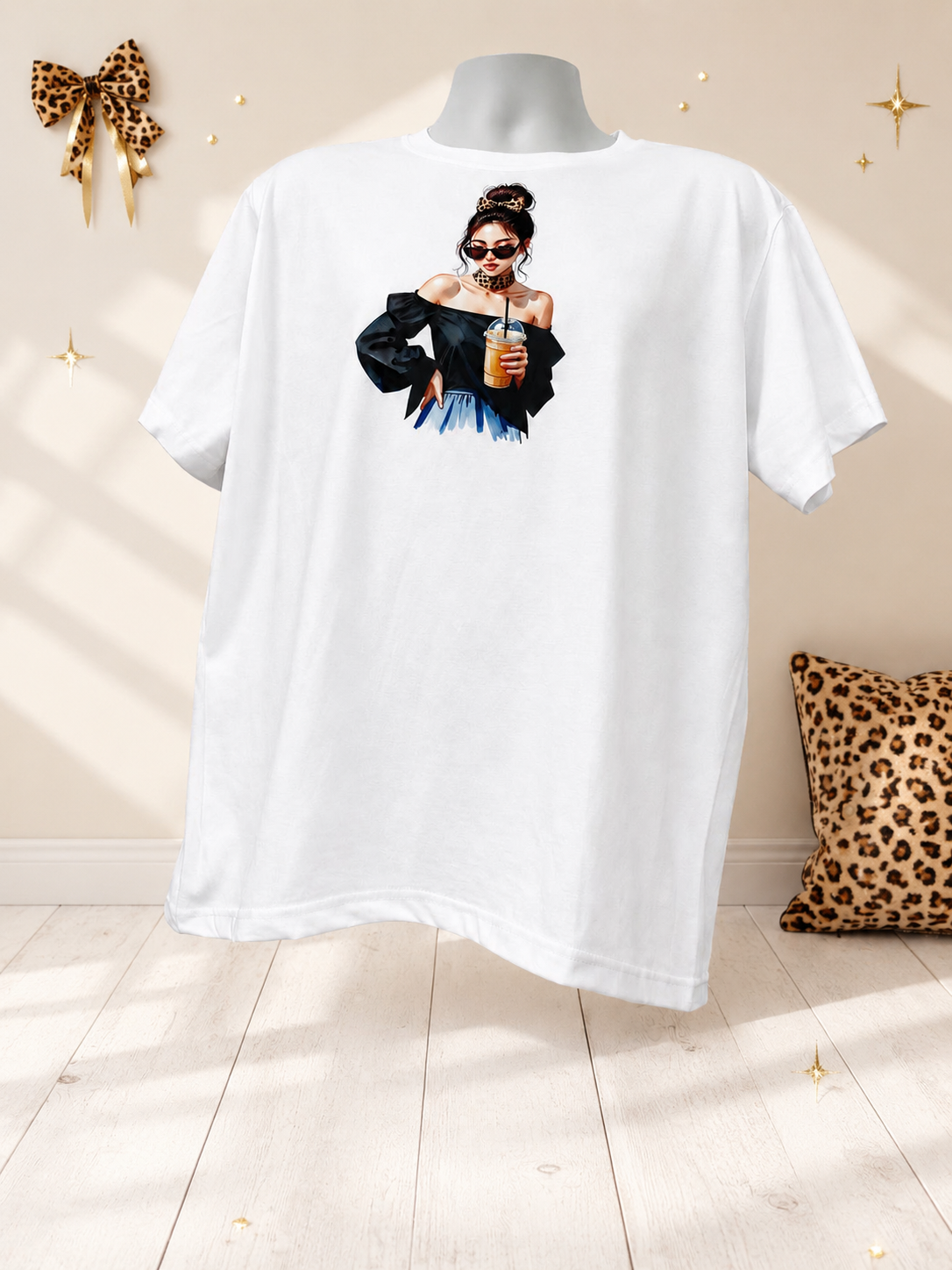 Short-sleeve shirt featuring a design of a girl drinking iced coffee.