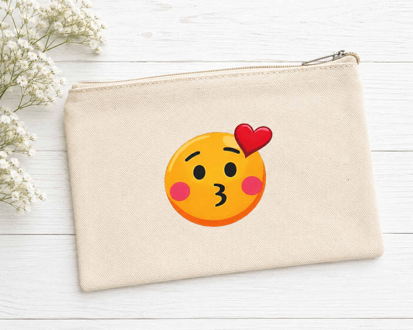 Beautiful beige pencil or cosmetic case featuring a blowing-a-kiss emoji design