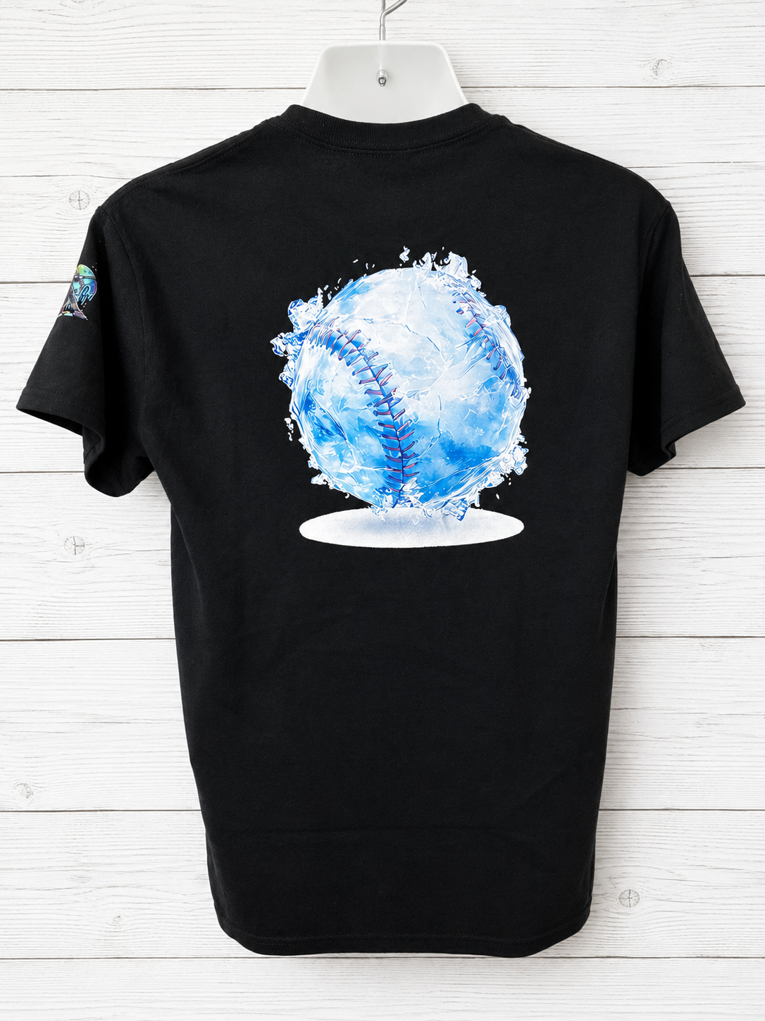 Short-sleeved T-shirt featuring a design with a large logo on the back and a small one on the sleeve; the graphic depicts a frozen baseball. Beautiful soft light blue color.