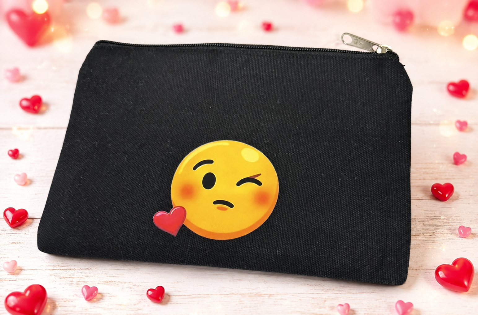 Beautiful black pencil or cosmetic case featuring a winking emoji design