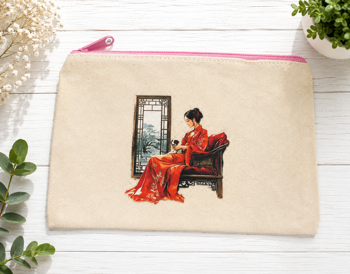 Beautiful zippered canvas case featuring a design of a seated geisha holding a small dog.