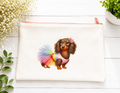Beautiful canvas zippered pouch or pencil case featuring a brown dog design with a tutu and an orange zipper